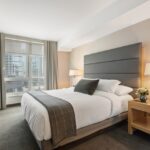 Stylish boutique hotel room with warm lighting and curated decor