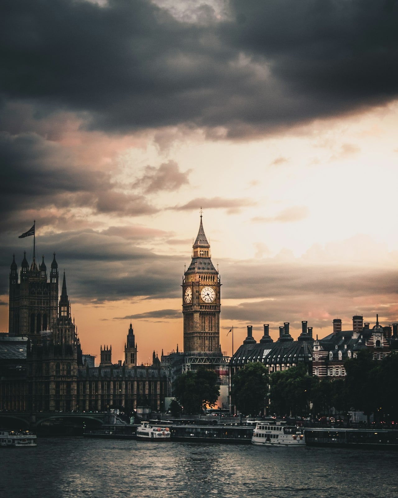 London skyline glowing warm orange during golden hour dusk