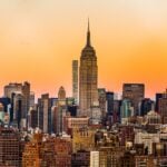 New York City skyline at dusk with Empire State Building lit up