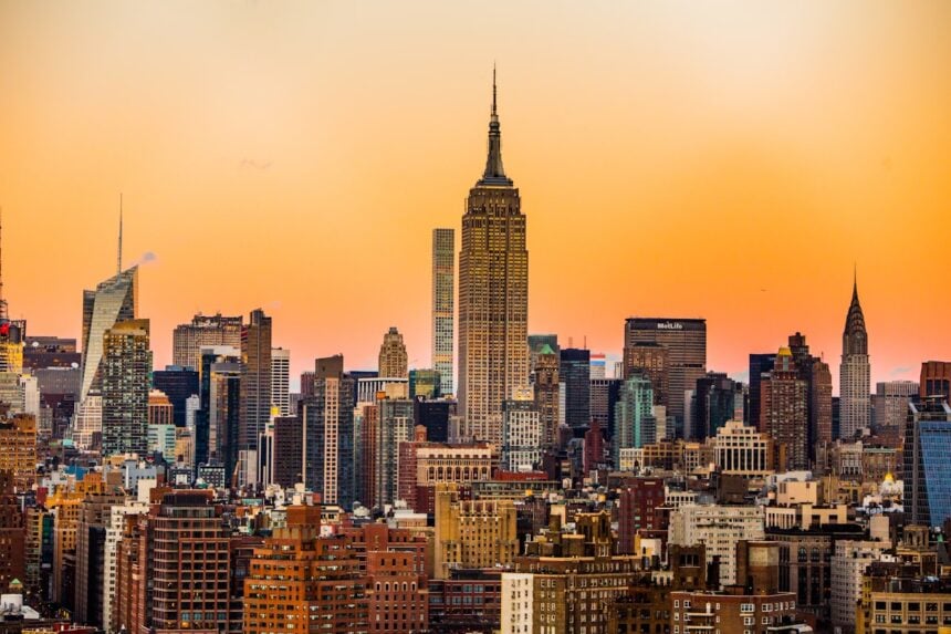 New York City skyline at dusk with Empire State Building lit up