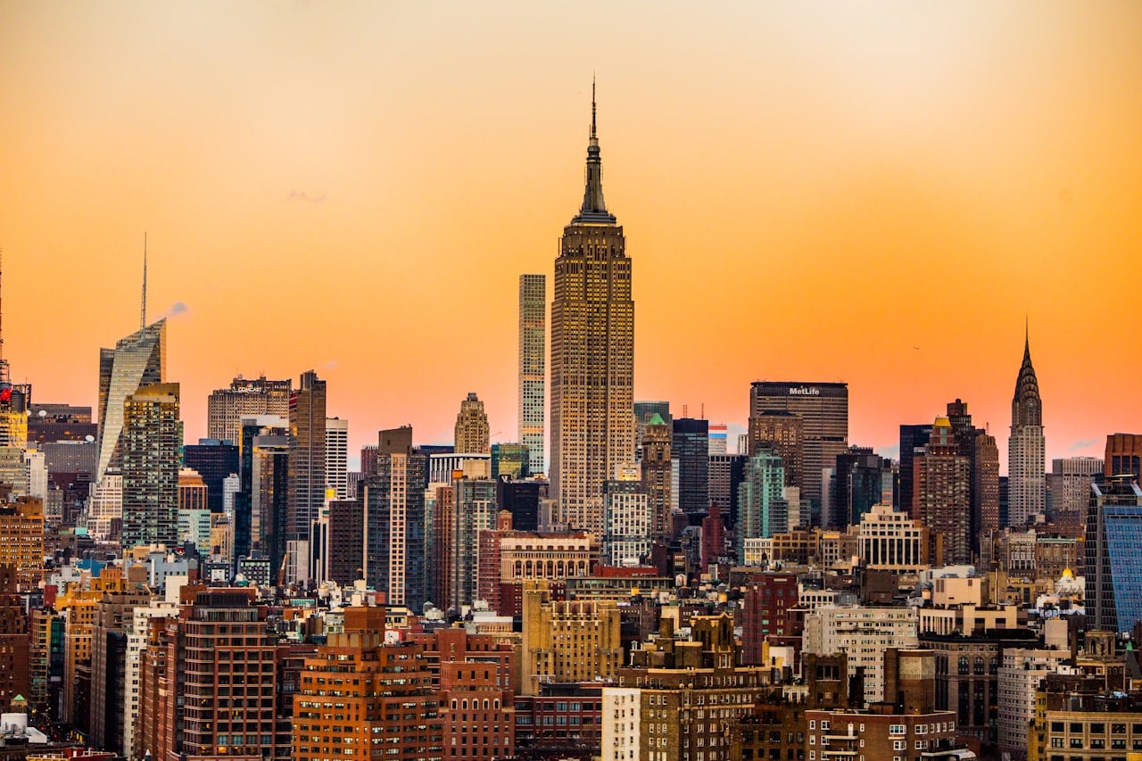 New York City skyline at dusk with Empire State Building lit up