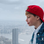 One World Observatory panoramic view New York City skyline above clouds