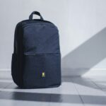 Neatly packed open suitcase with travel capsule wardrobe