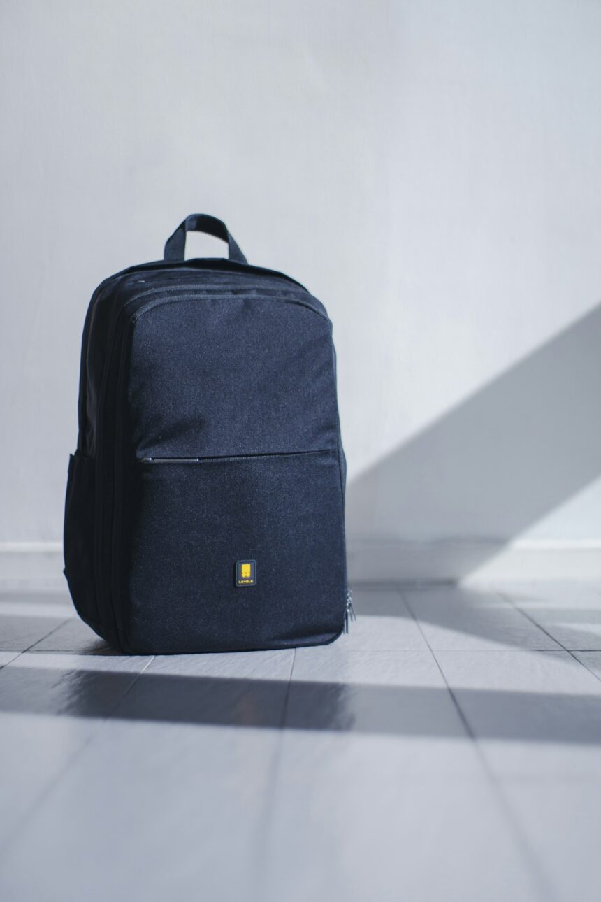 Neatly packed open suitcase with travel capsule wardrobe