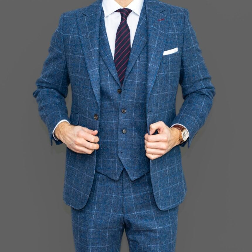 Woman in tailored blazer and trousers styled for evening out