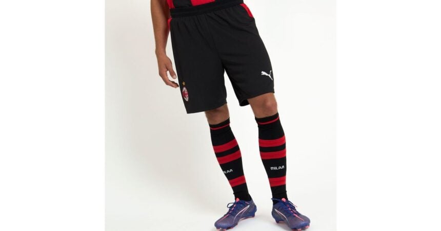 AC Milan home kit jersey front view in iconic red and black stripes