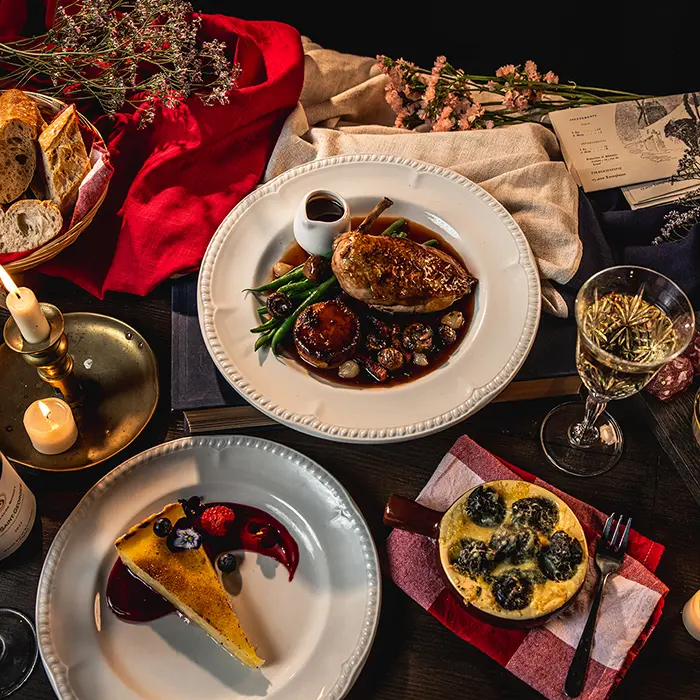 Three-course French banquet fine dining menu at Chat Noir immersive cabaret London