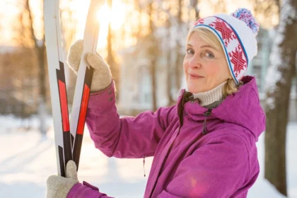 Skier on a snowy slope with winter sports travel insurance