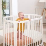 Boori Oasis Oval Cot styled in a bright nursery