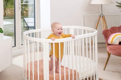 Boori Oasis Oval Cot styled in a bright nursery