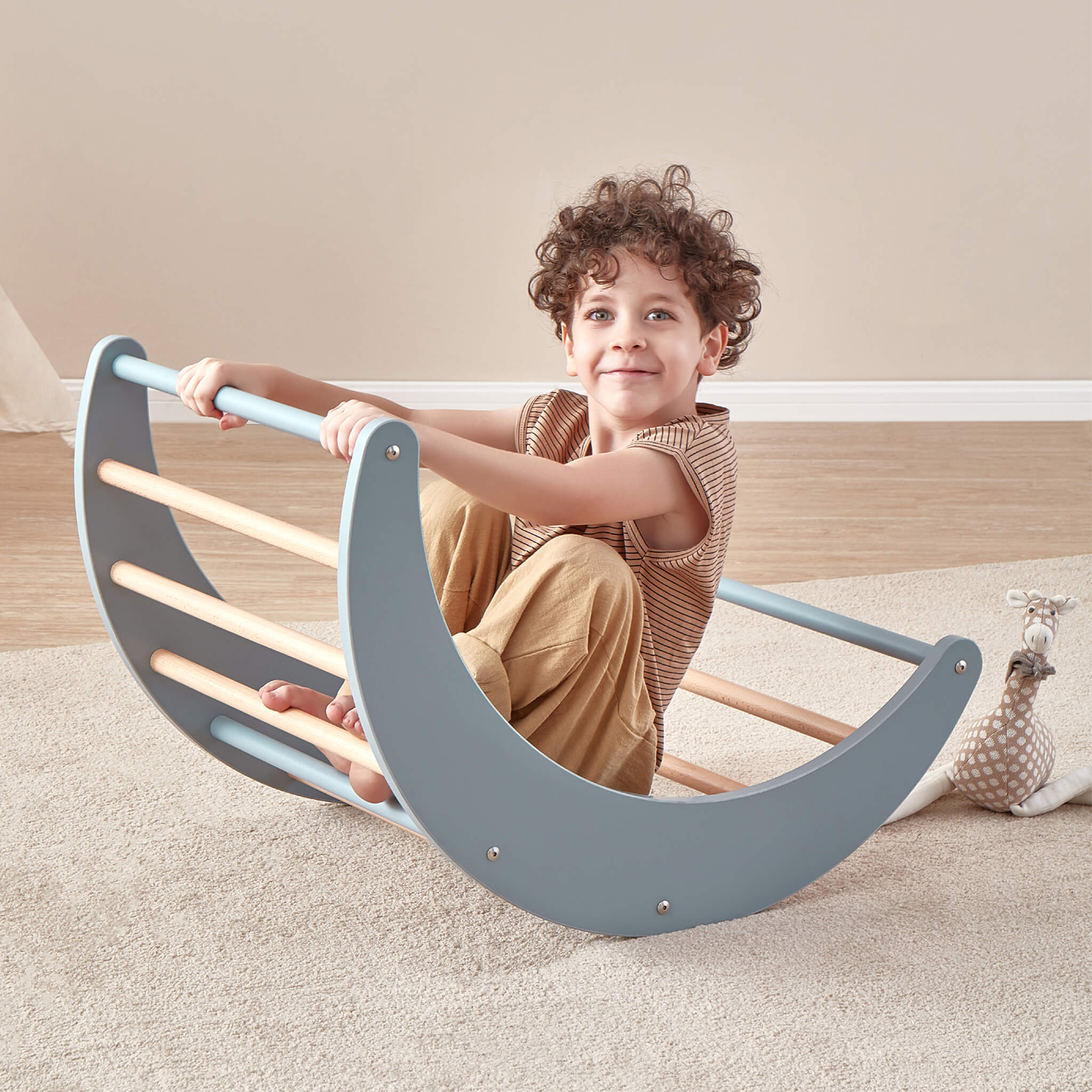 Child using the Boori Tidy Climbing Arch indoors