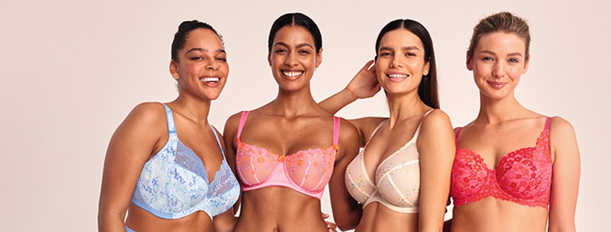 Four women modelling colourful Bravissimo fuller-bust lingerie together