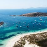 Ses Illetes beach in Formentera with clear blue water and pale sand