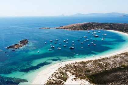 Ses Illetes beach in Formentera with clear blue water and pale sand