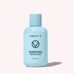 Happy V Feminine Wash bottle on a gray background