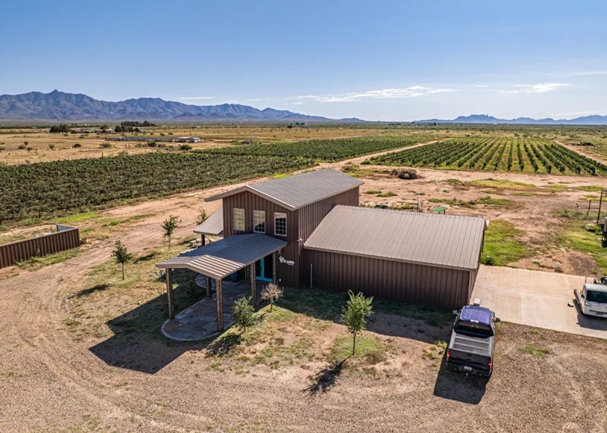 Winery building and vineyard at a Harvest Hosts location in Arizona
