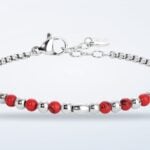 Bracciale da bambino Luca Barra in acciaio con sfere e pietre rosse