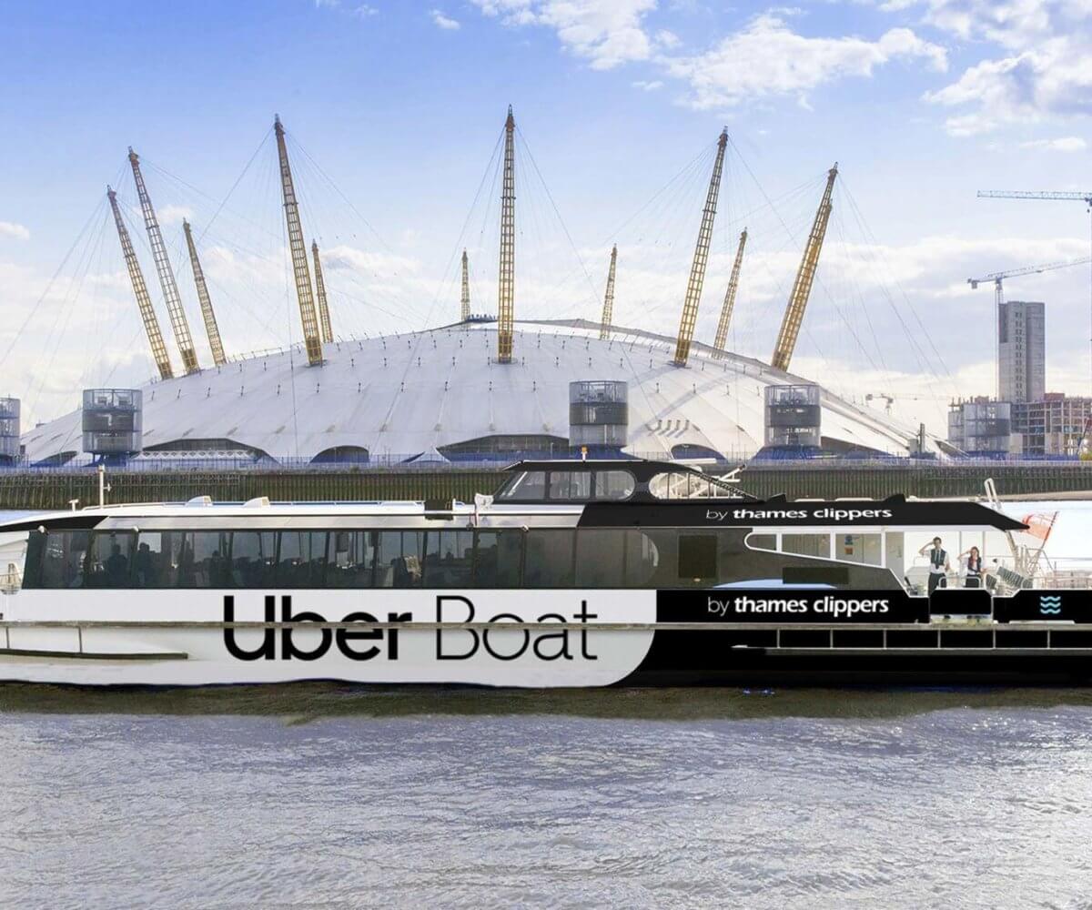 Uber Boat by Thames Clippers passing The O2 in London