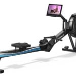 Merach R50 Pro rower in a home gym
