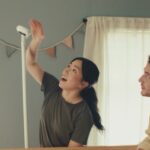 Nanit baby monitor camera in a nursery scene