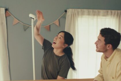 Nanit baby monitor camera in a nursery scene