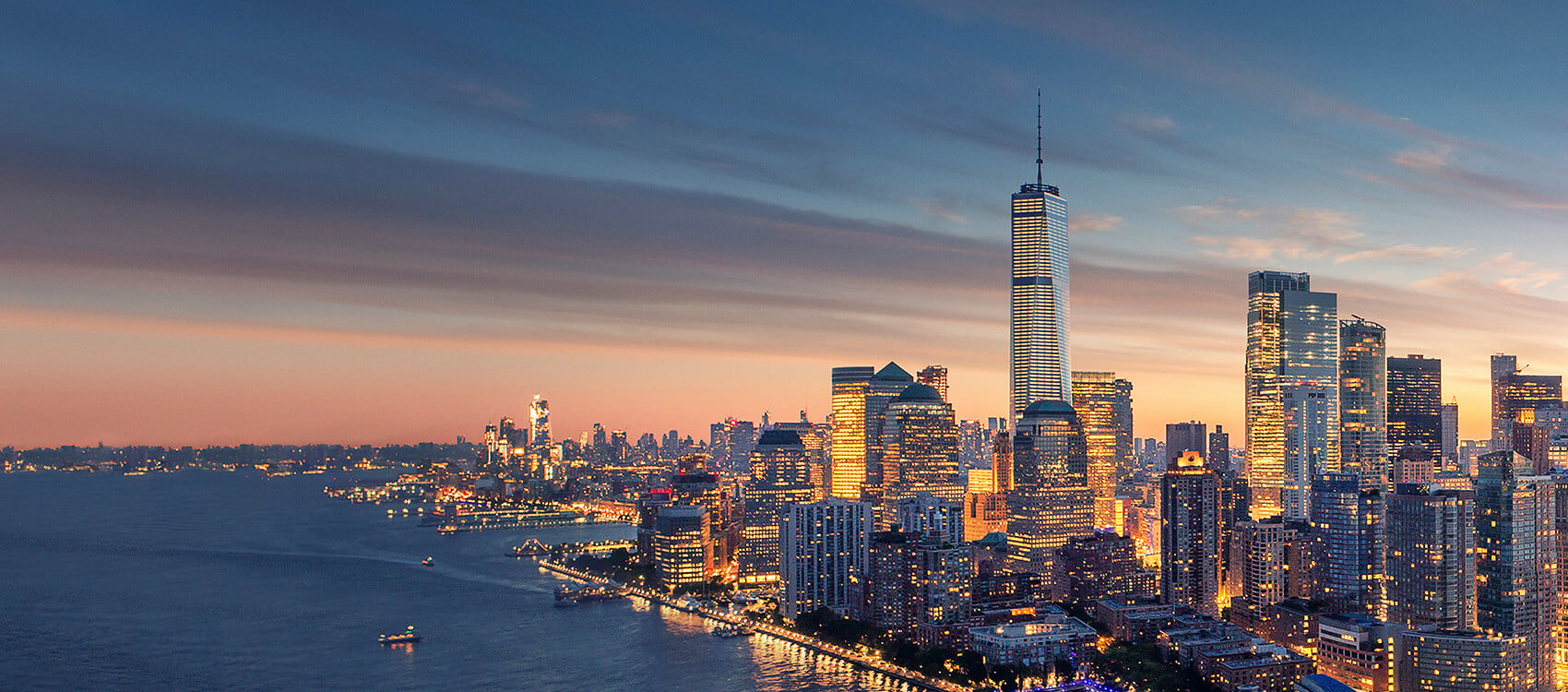 New York skyline at night for the One World Observatory late night package