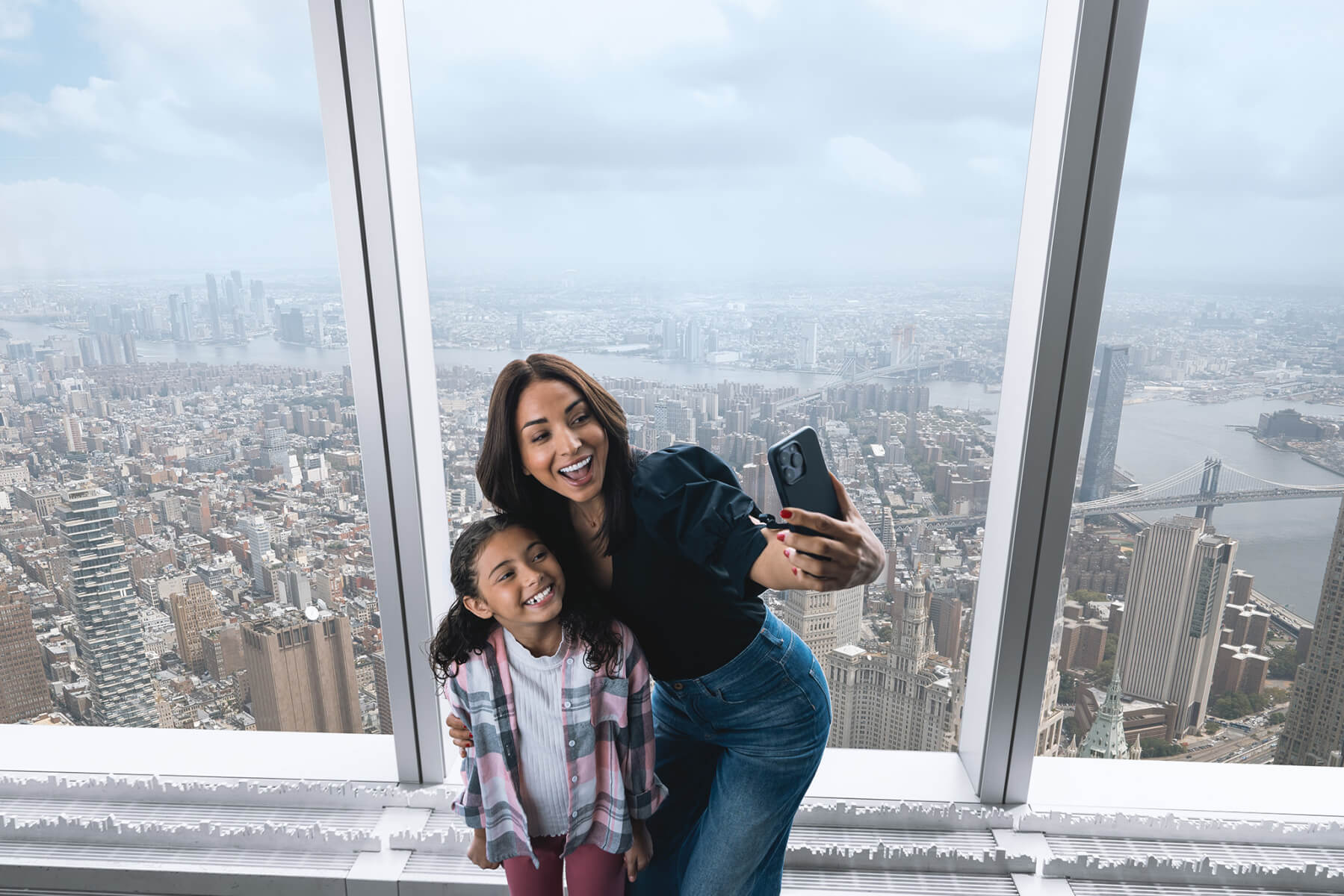 Visitors enjoying the observation floor at One World Observatory