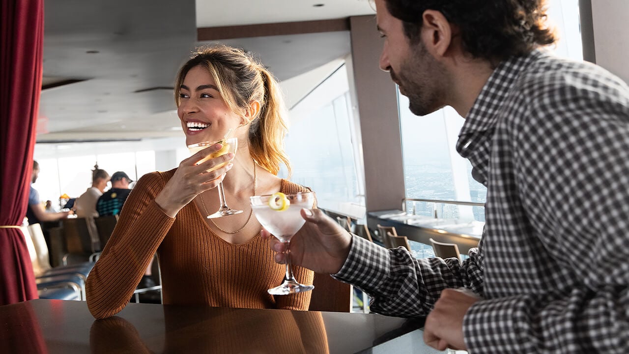 Guests enjoying cocktails at ONE Dine