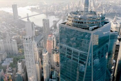 Aerial view of One World Trade Center and One World Observatory above Lower Manhattan