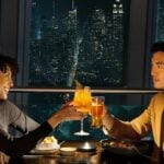 Guests dining with the New York skyline at One World Observatory