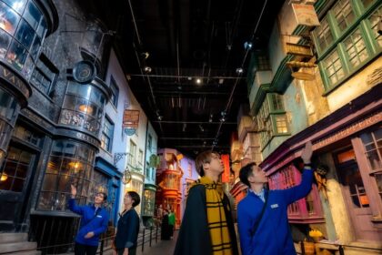 Visitors walking through the Diagon Alley set at Warner Bros. Studio Tour Tokyo