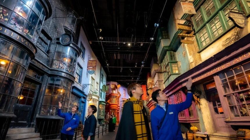 Visitors walking through the Diagon Alley set at Warner Bros. Studio Tour Tokyo