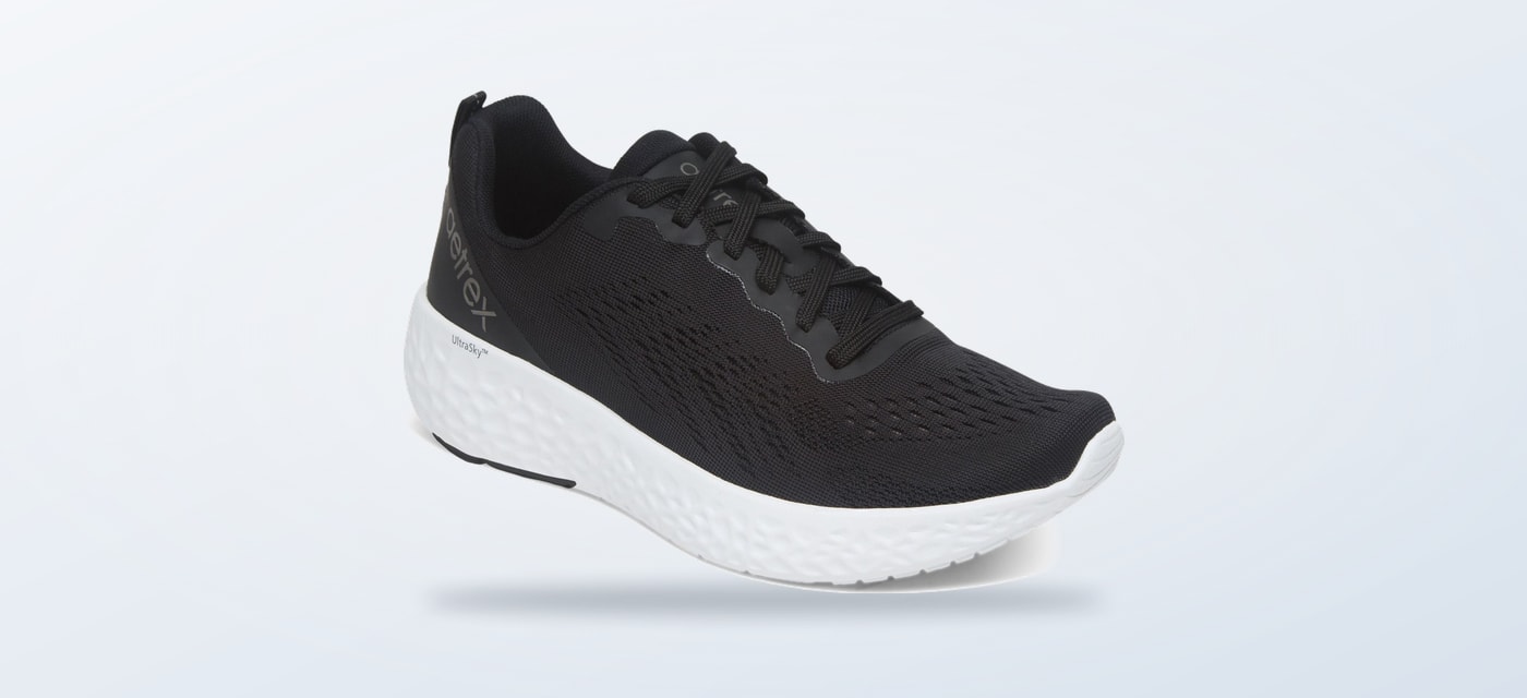 Black Aetrex Danika arch support sneaker shown from the side