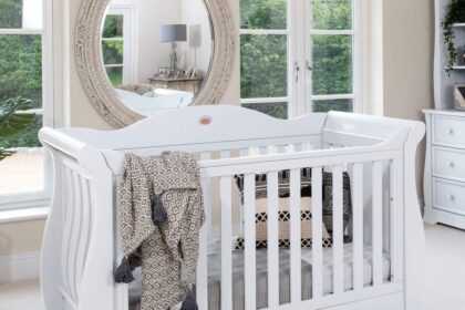 Boori Sleigh Royale cot bed in a nursery setting