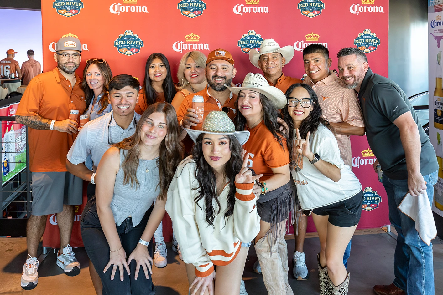 Fans experiencing college football inside a Cosm venue