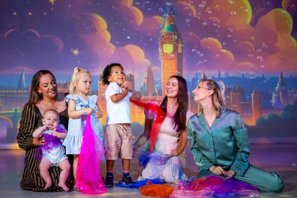 Parents and children enjoying a Frameless Multi-Sensory Tots session