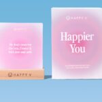 Happy V affirmation cards and presentation box on a blue background