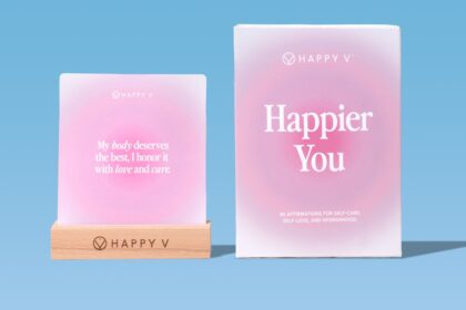 Happy V affirmation cards and presentation box on a blue background