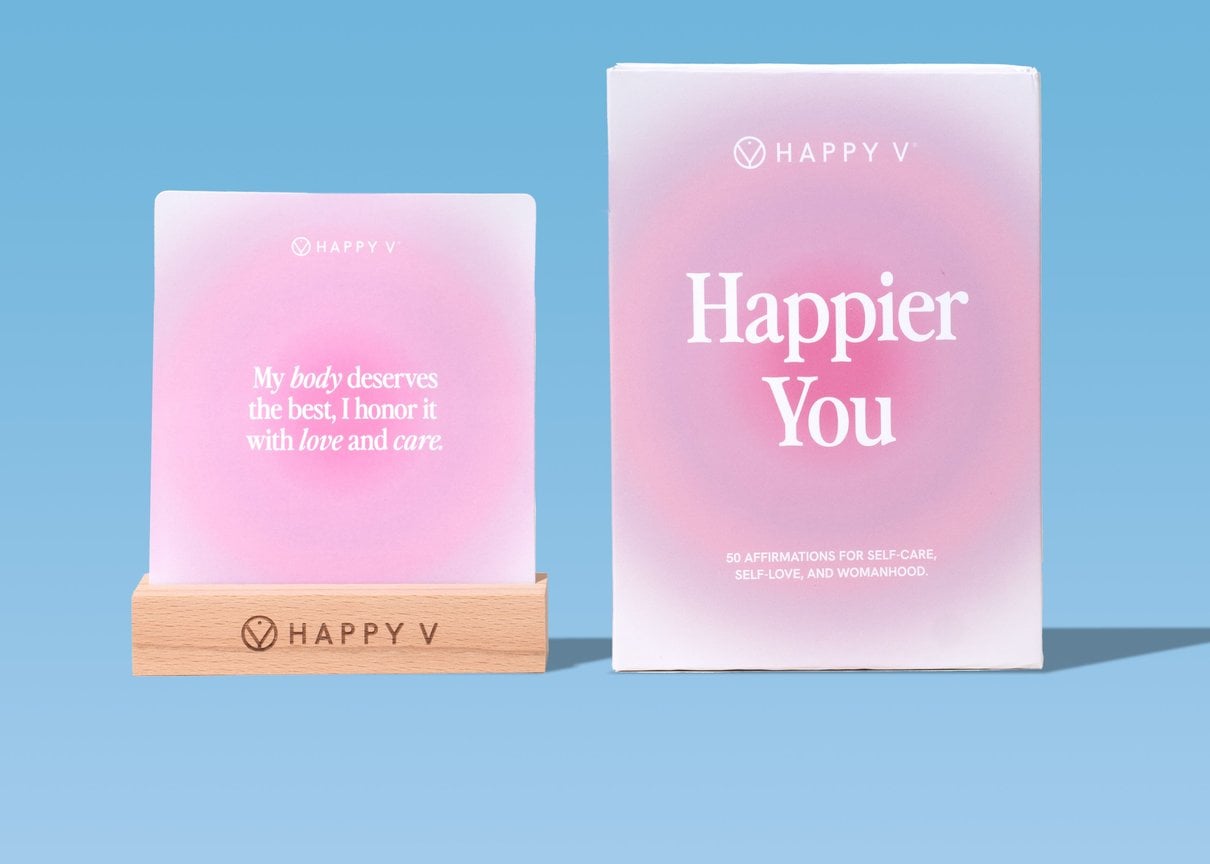 Happy V affirmation cards and presentation box on a blue background