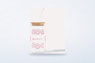 Happy V Smiley glass cup with a straw