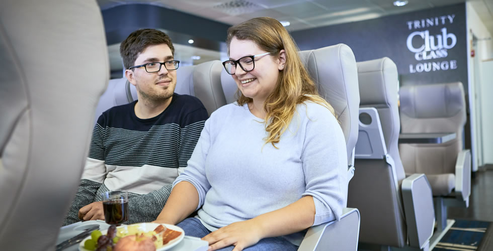 Couple relaxing in the Dublin Swift Club Class lounge