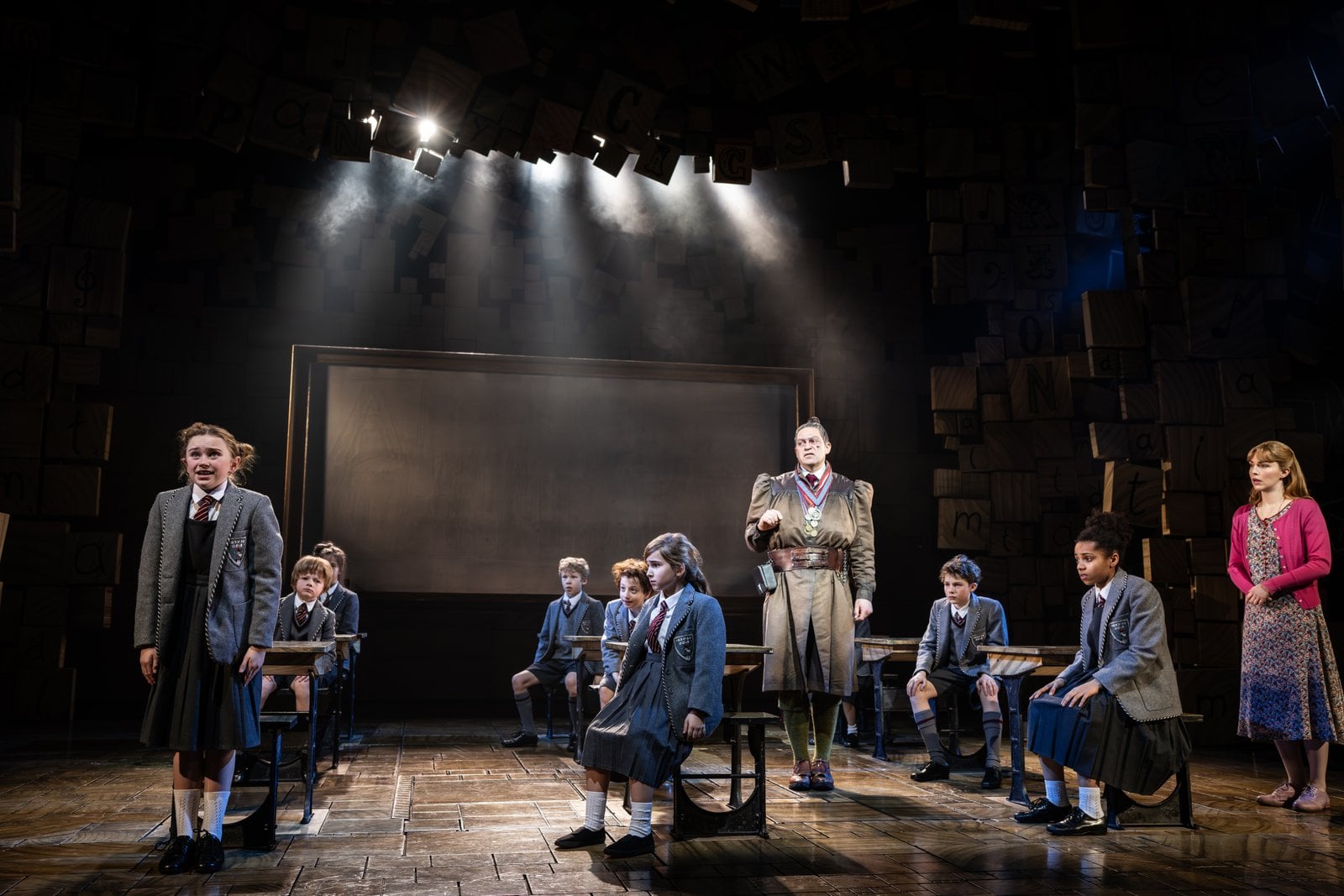 Matilda The Musical performers in a stage scene