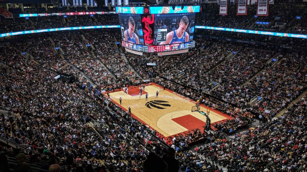 Basketball game arena crowd