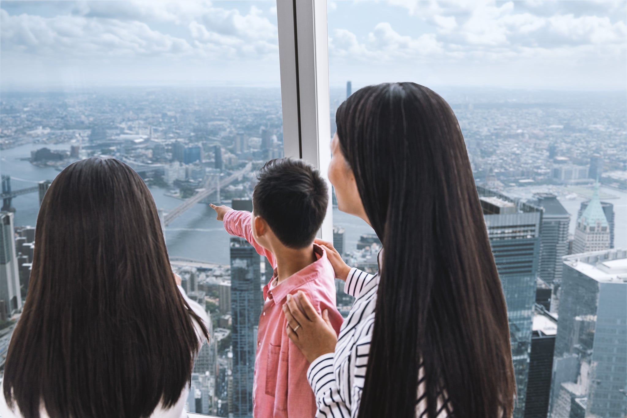 Family visitors enjoying the observatory view at One World Observatory