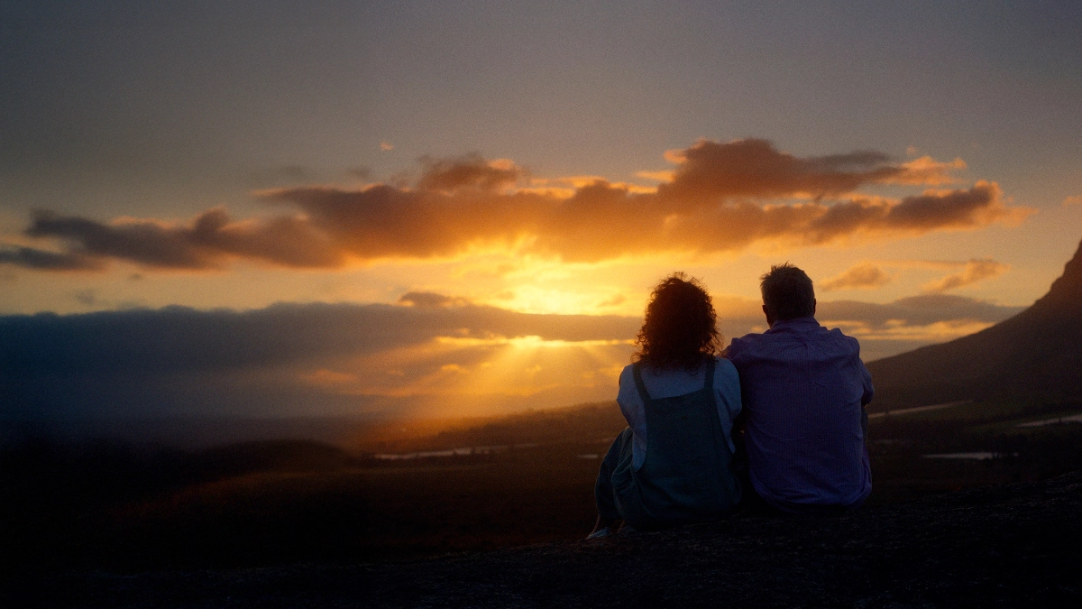 Travellers enjoying a sunset holiday scene