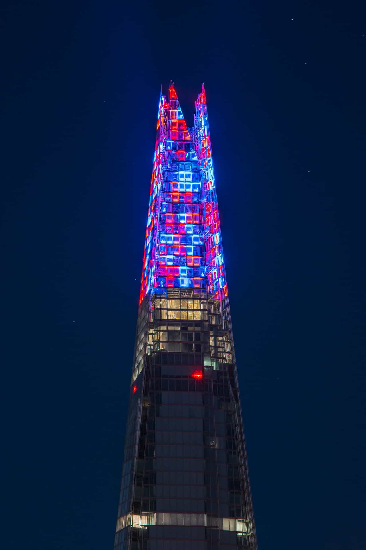 The Shard lit at night above London