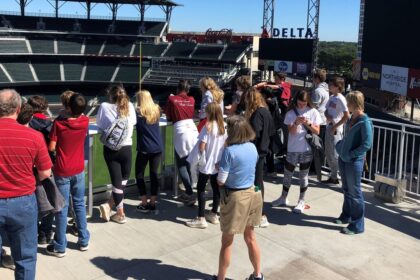 A group taking a tour at Truist Park