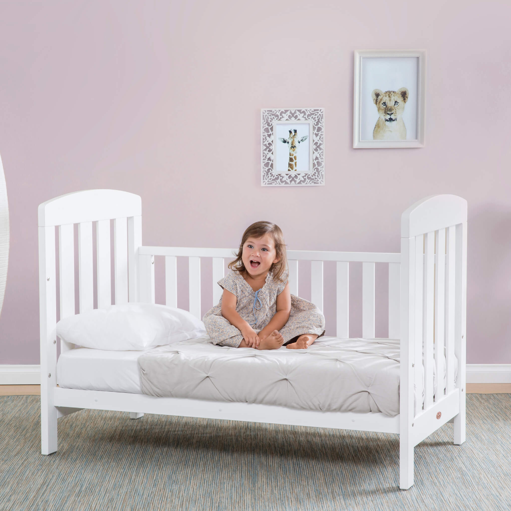 Alice cot bed in a nursery setting