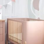 Nova cot bed styled in a nursery