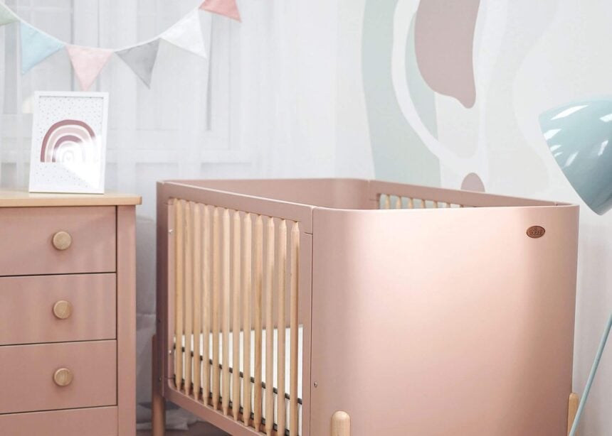 Nova cot bed styled in a nursery